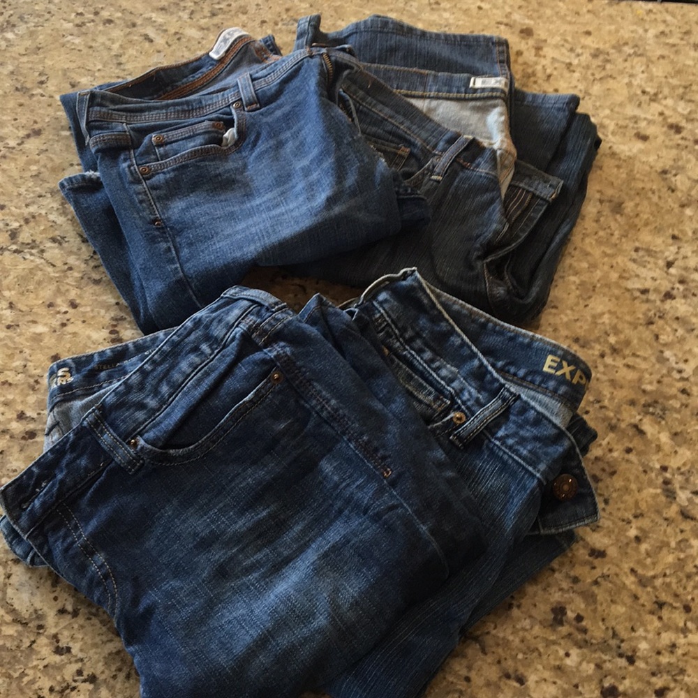 4 pairs size 8 boot cut Express Jeans